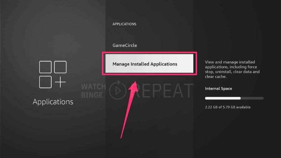 A user interface highlighting the "Manage Installed Applications" option with a pink box and arrow, with text describing the function to manage apps and internal space available.