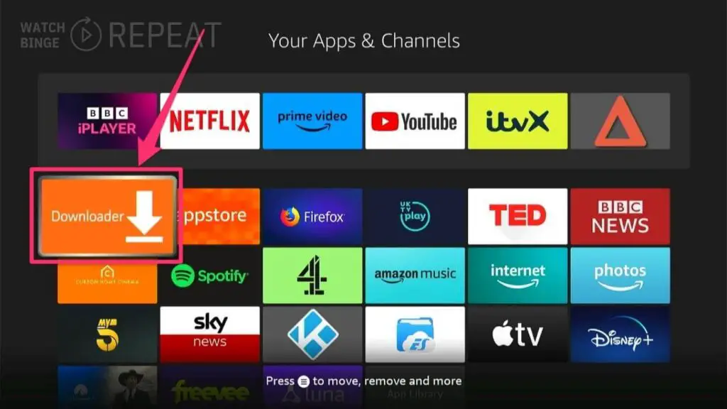 A user interface of a Fire TV with the 'Downloader' application icon selected and a red arrow pointing to it, possibly showing how to download apps.