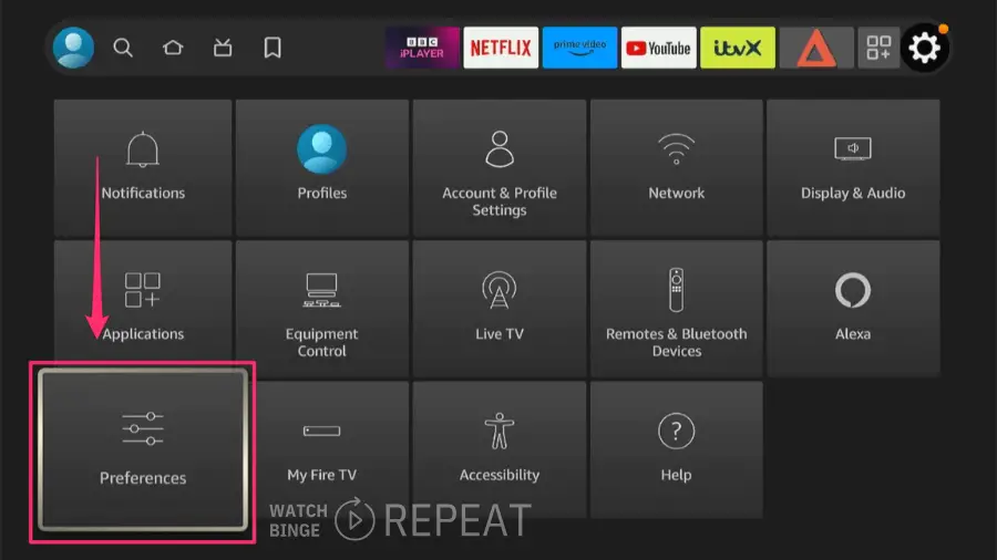 A Firestick menu interface, highlighting the 'Applications' option with a red arrow pointing to 'Preferences'.