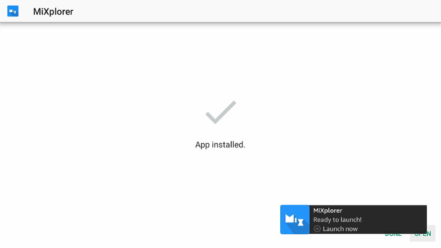 A confirmation screen on Firestick showing "App installed" with a checkmark. Below is a notification with the app's name, MiXplorer, stating "Ready to launch!" and providing an option to "Launch now".