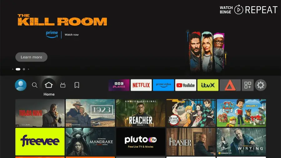 Firestick home screen showcasing a selection of streaming services like BBC iPlayer, Netflix, YouTube, and Prime Video. The focus is on a highlighted advertisement for 'The Kill Room' with options to learn more or watch now.